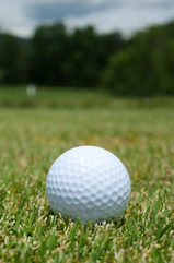 Stock photo of golf ball on golf links